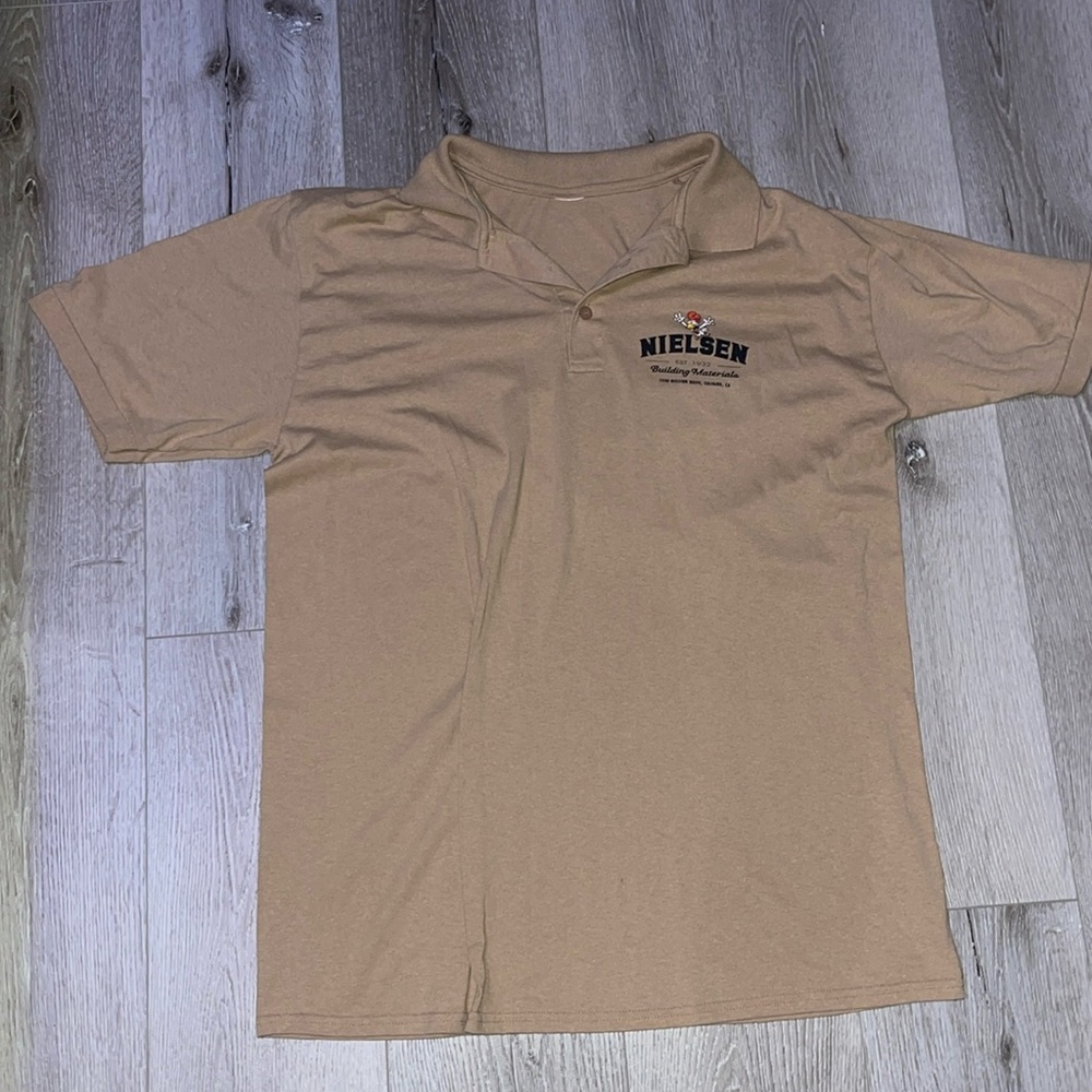 Super cool tan oversized solvang California collared t shirt